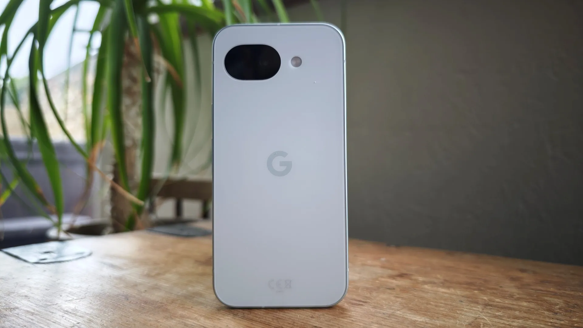 Render of Google Pixel 11a showing its slim camera oval and Orchid colour
